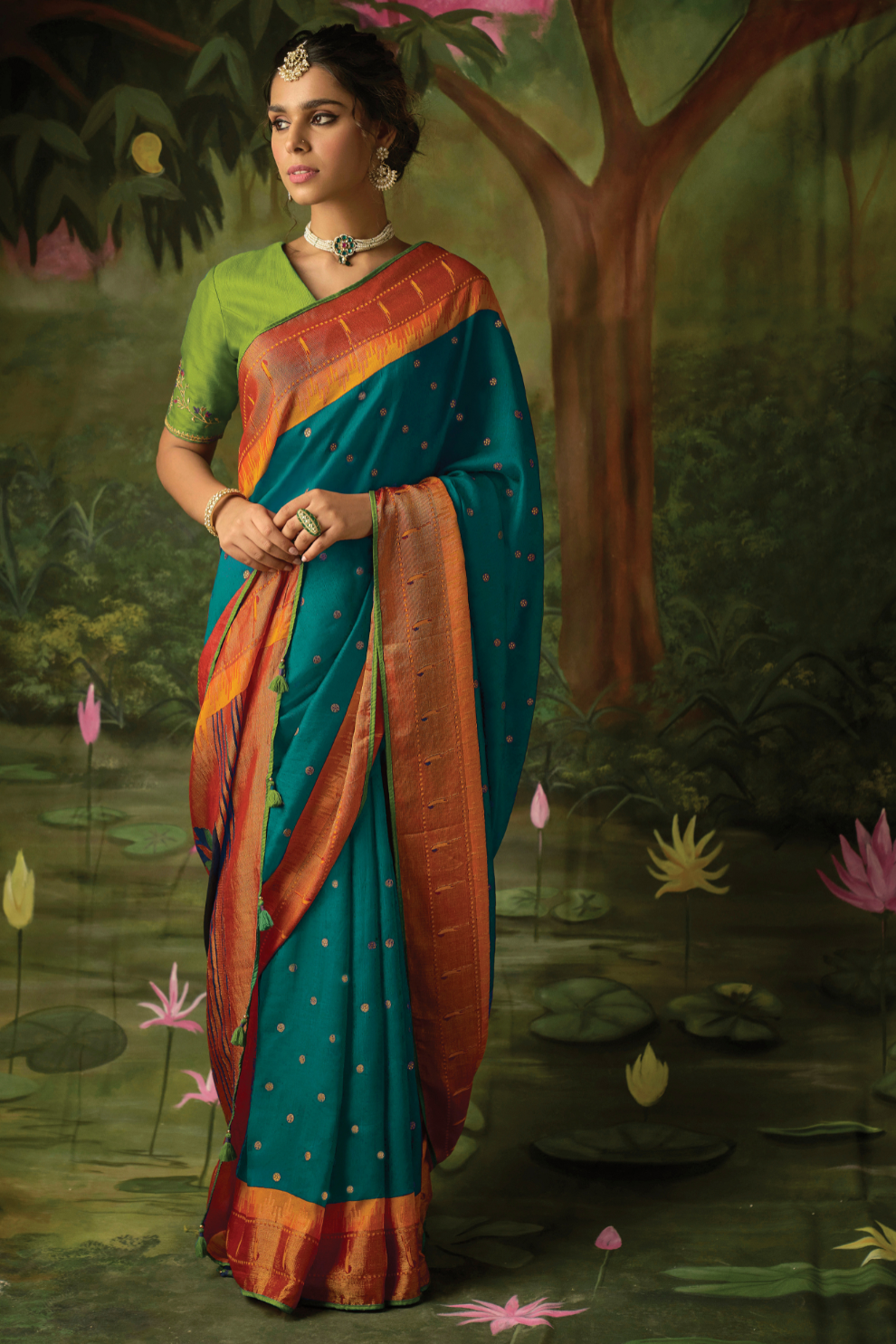 Teal Elegance Brasso Saree with Intricate Thread & Zari Work