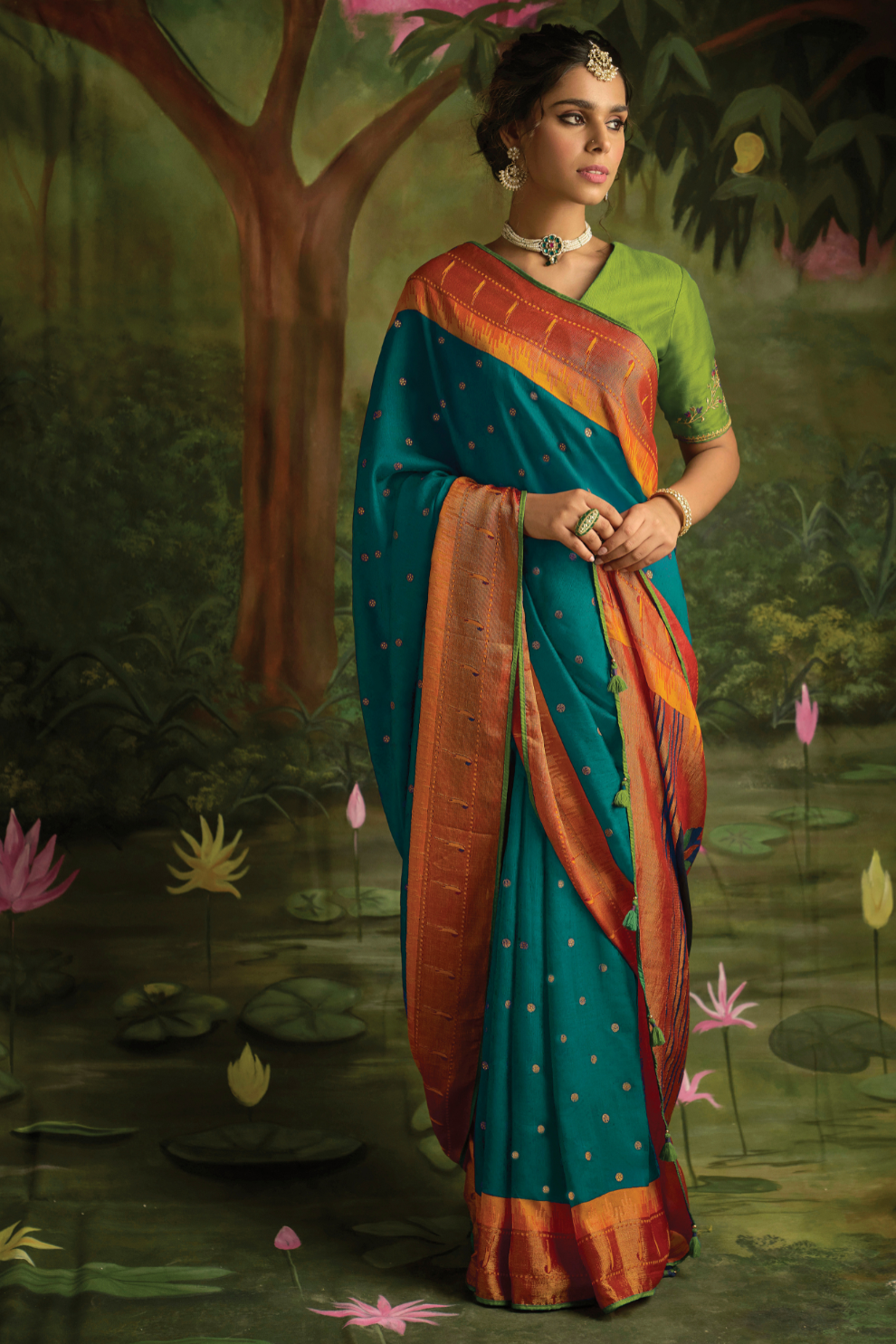 Teal Elegance Brasso Saree with Intricate Thread & Zari Work
