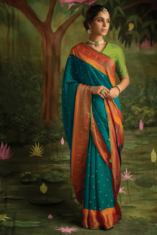 Teal Elegance Brasso Saree with Intricate Thread & Zari Work