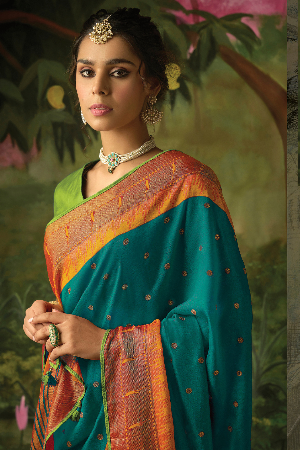 Teal Elegance Brasso Saree with Intricate Thread & Zari Work