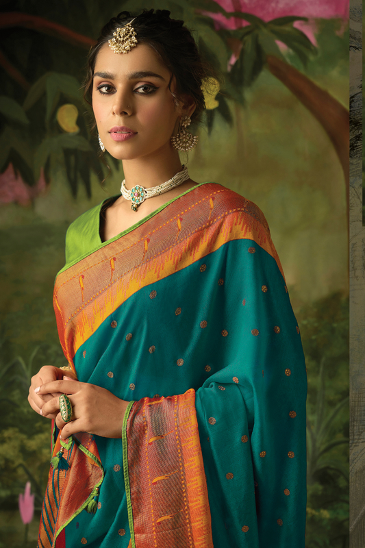 Teal Elegance Brasso Saree with Intricate Thread & Zari Work