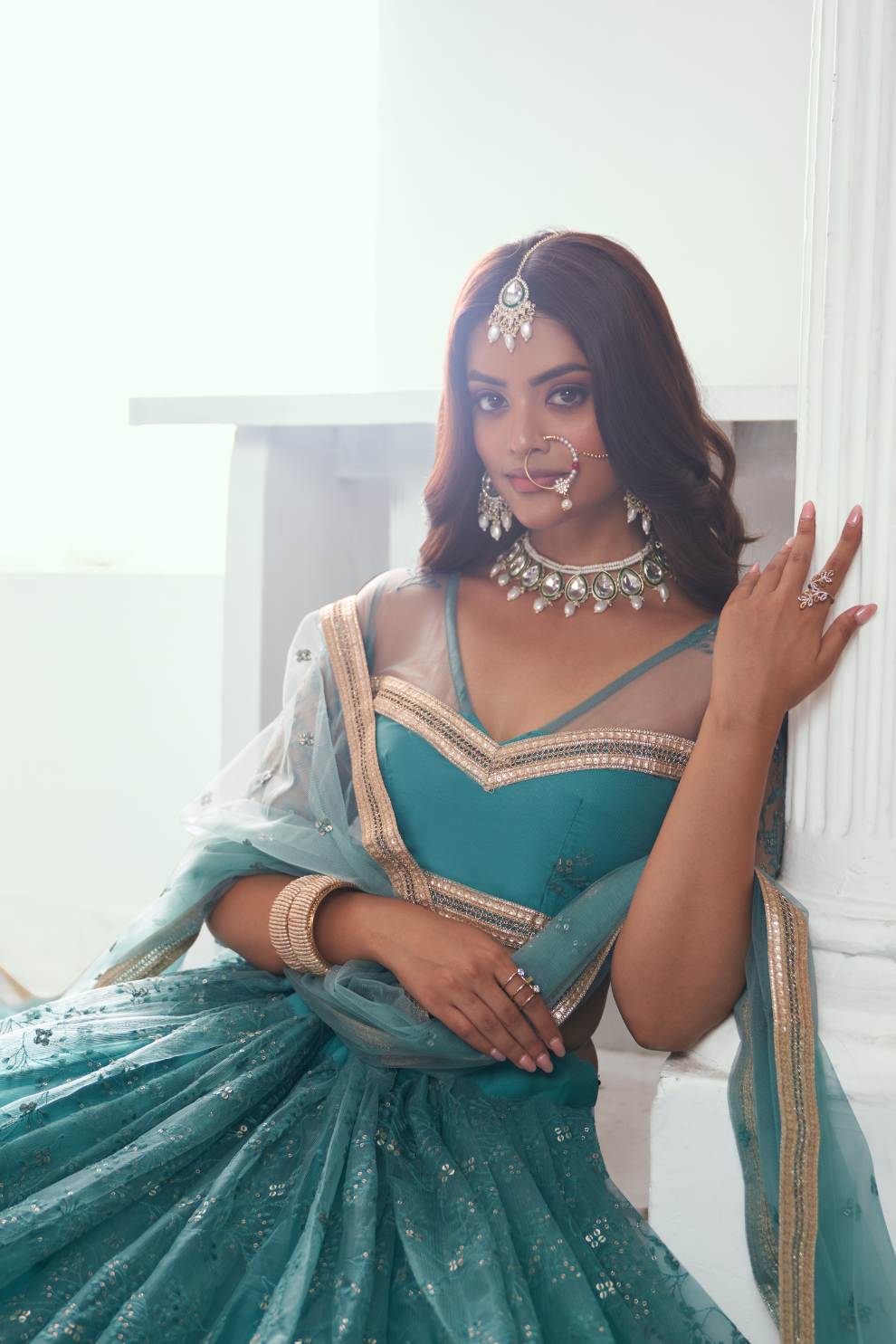 Graceful Net Lehenga Choli with Intricate Embroidery for Engagement Wear