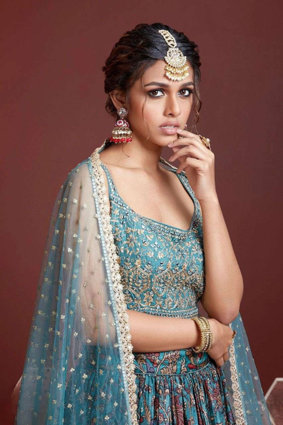 Chiffon Lehenga Choli with Embroidery and Sparkling Embellishments