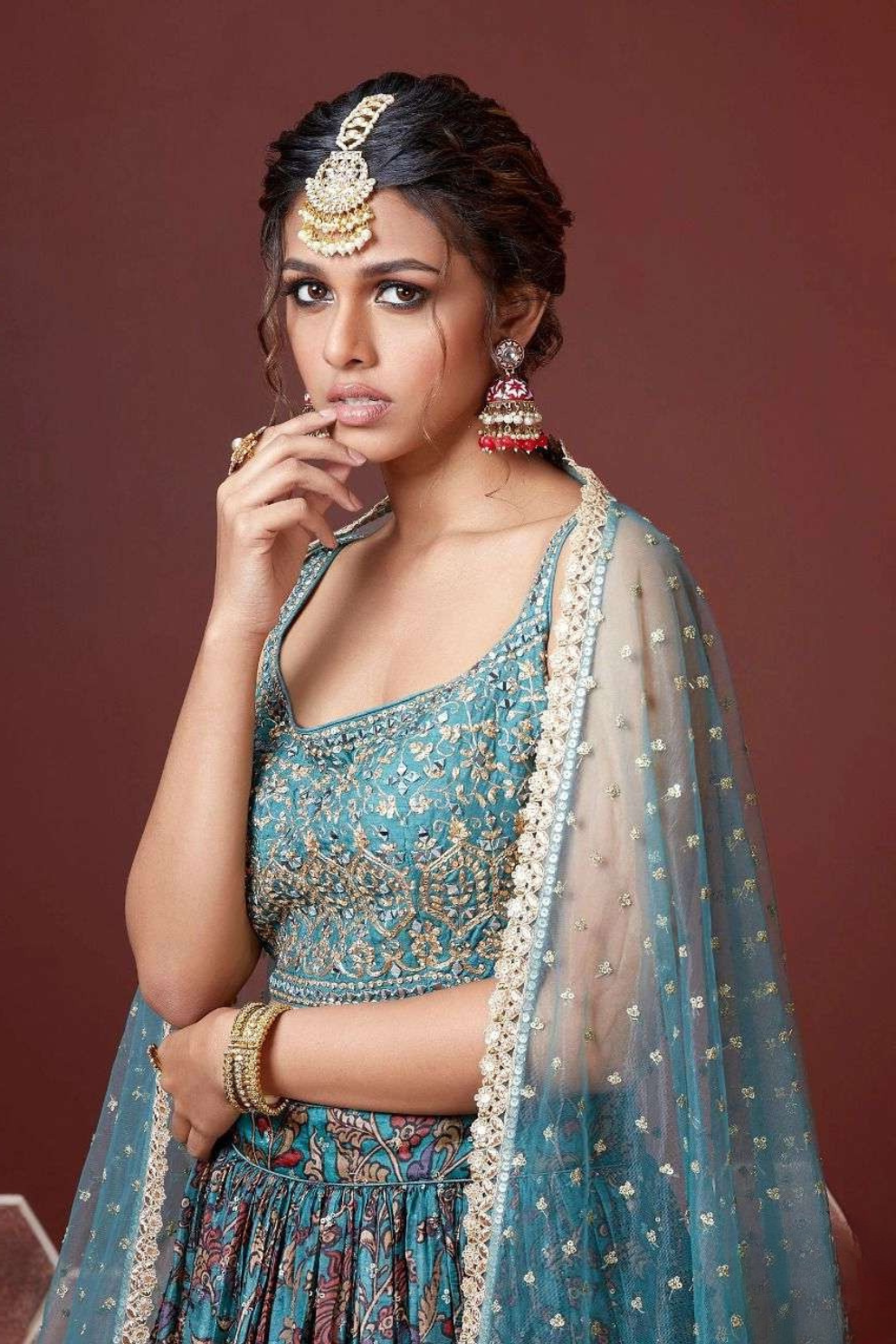 Chiffon Lehenga Choli with Embroidery and Sparkling Embellishments
