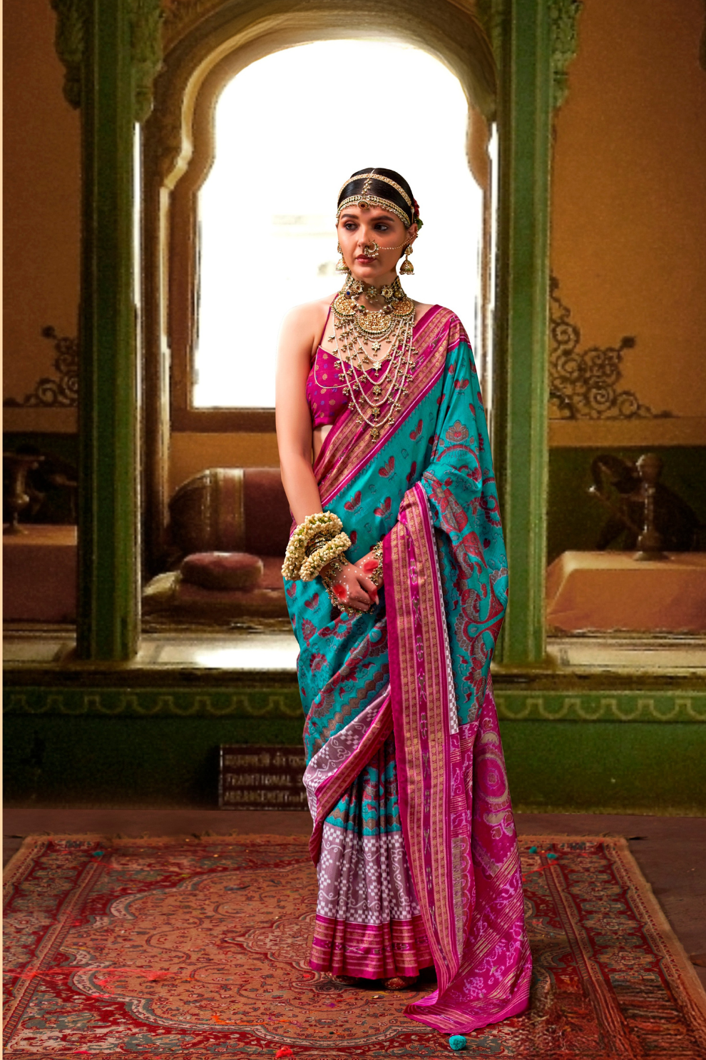 Patola Printed Sigma Silk Saree with Gold Accents