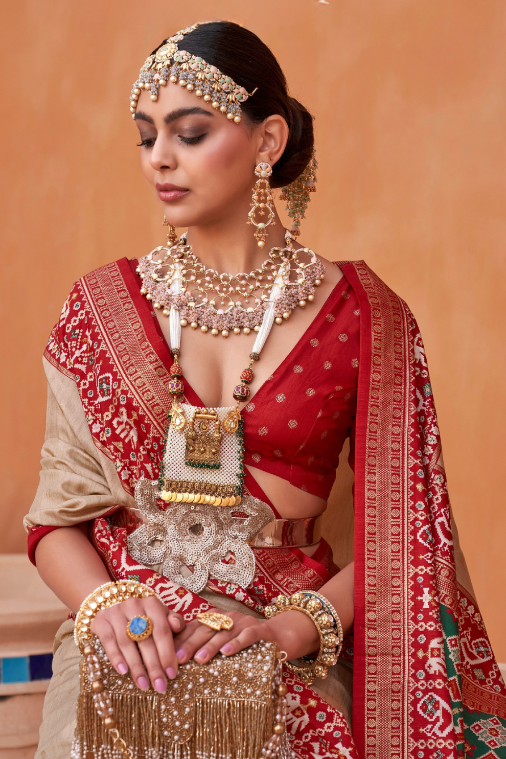 Elegant Zari Patola Saree with Polka Dot Woven Design