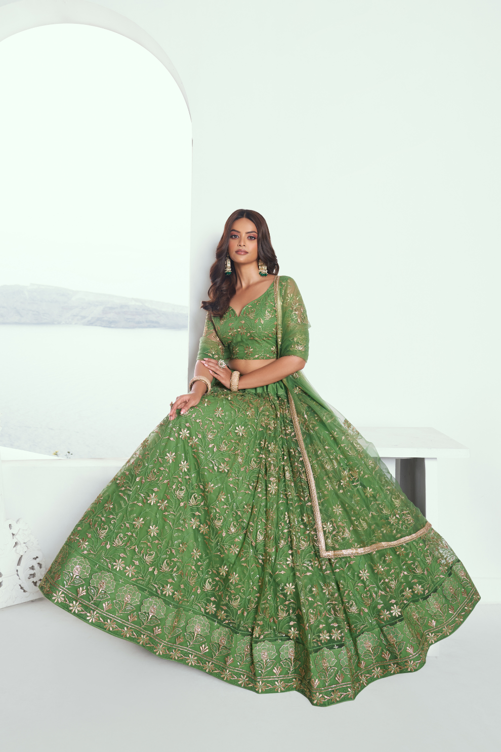 Graceful Net Lehenga Choli with Intricate Embroidery for Engagement Wear