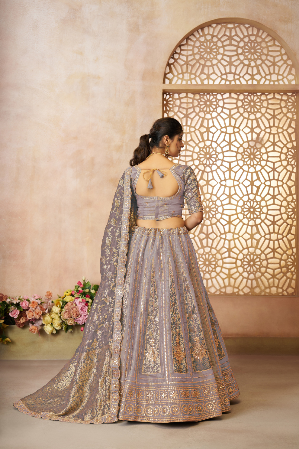 Luxurious Tissue Lehenga Adorned with Banarasi Patches and Zari Craftsmanship