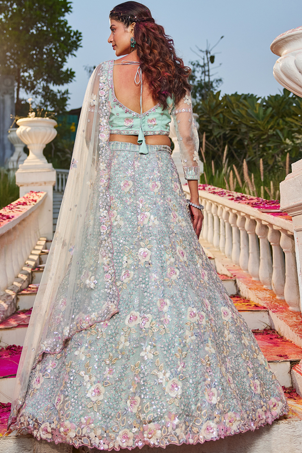 Designer Net Lehenga Choli with Intricate Sequins and Zarkan Work