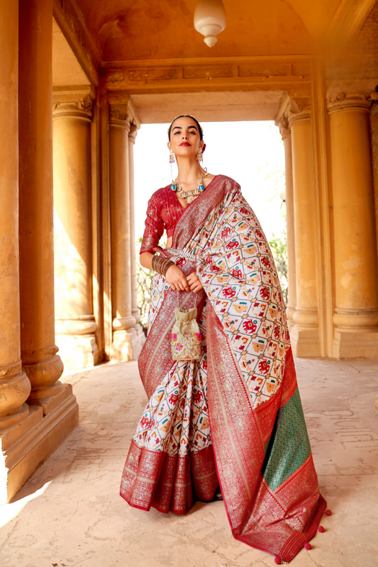 Artisanal Patola Silk Saree with Elegant Tassel Touch