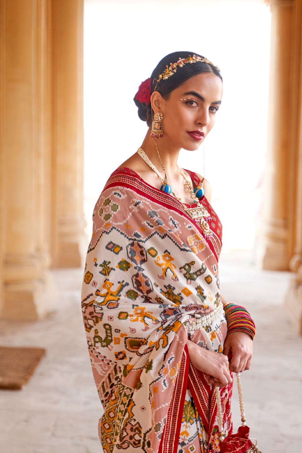 Artisanal Patola Silk Saree with Elegant Tassel Touch