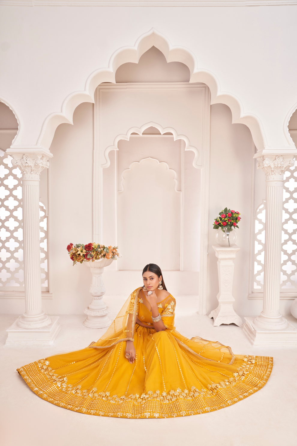 Elegant Net Lehenga Choli with Intricate Thread Embroidery