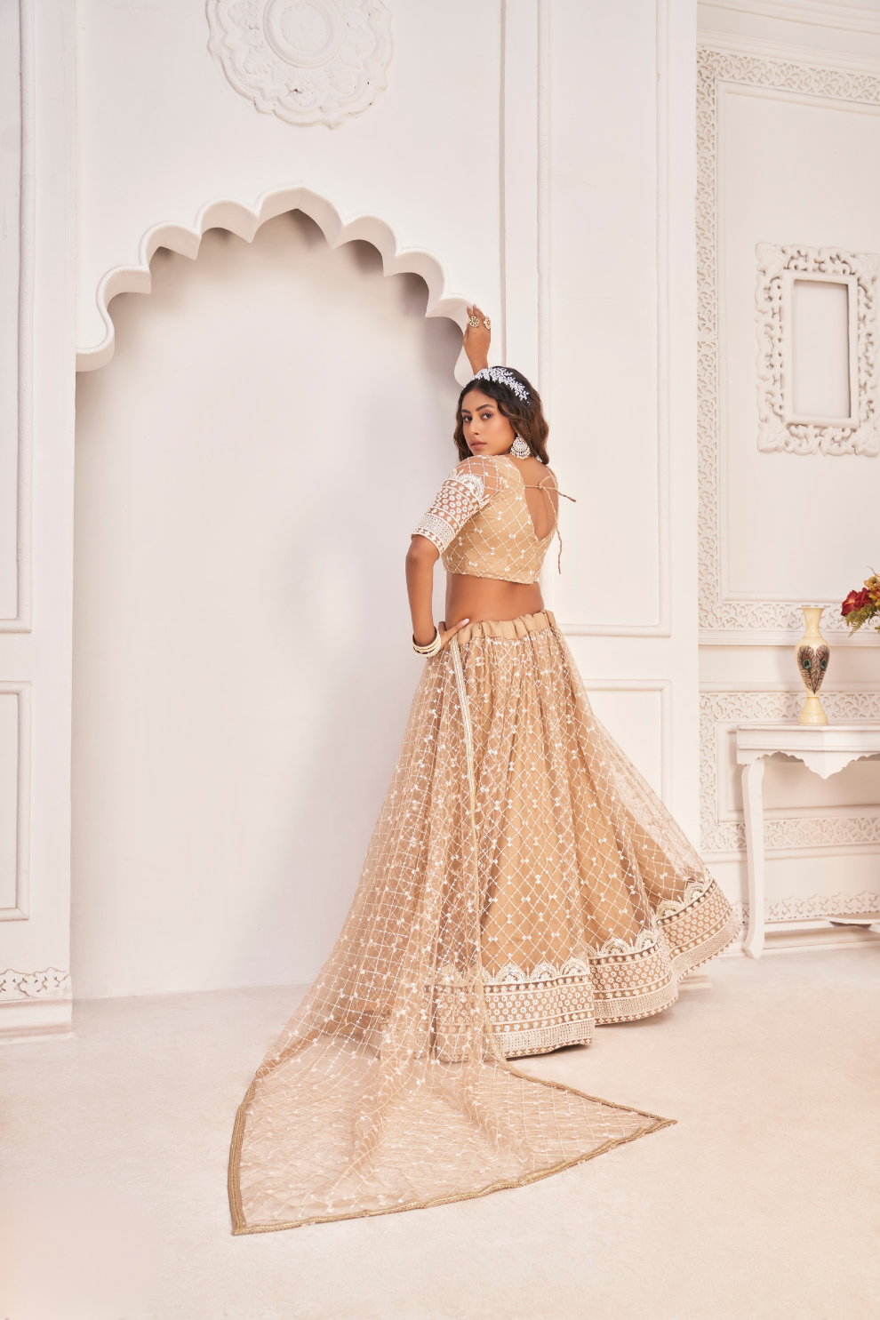 Elegant Net Lehenga Choli with Intricate Thread Embroidery