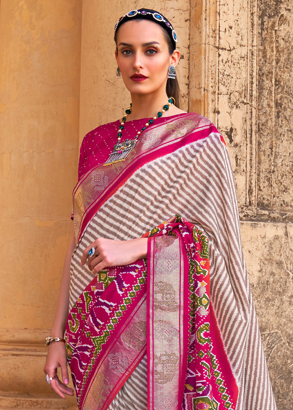 Magenta Pink Designer Patola Silk Saree with Zari Border & Stone work