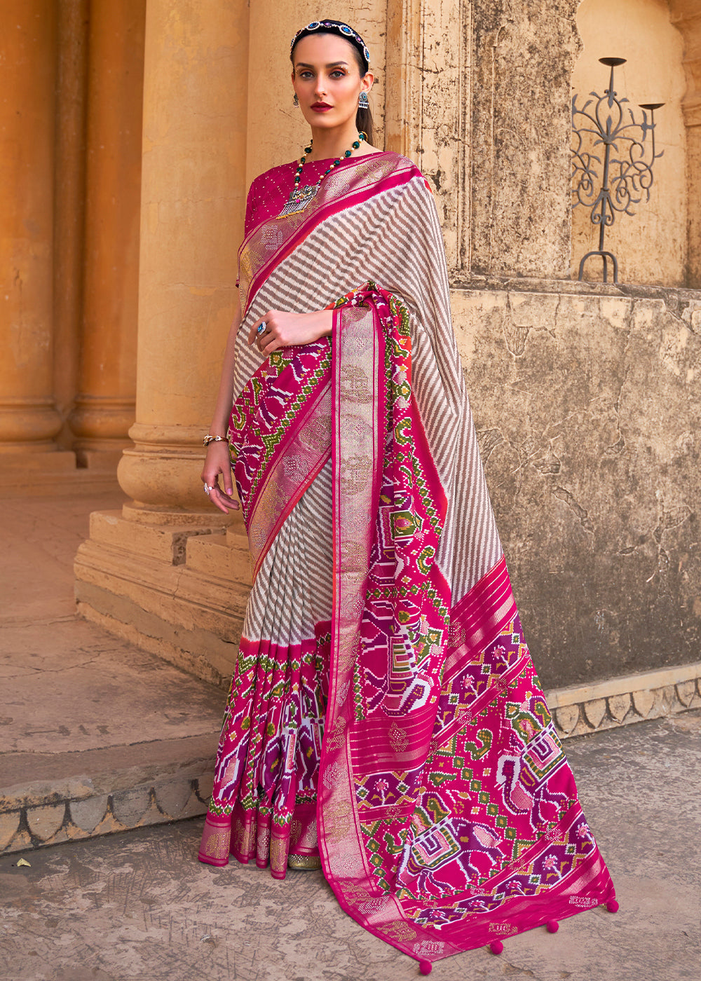 Magenta Pink Designer Patola Silk Saree with Zari Border & Stone work