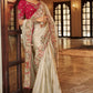 Cream Tissue Satin Saree with Rani Pink Embroidered Silk Blouse