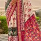 White & Red Patola Silk Saree with Zari Border & Tassels On Pallu