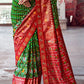 Kelly Green & Red Patola Silk Saree with Zari Border Pallu & Stone work