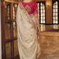 Cream Tissue Satin Saree with Rani Pink Embroidered Silk Blouse