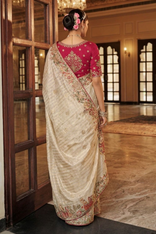 Cream Tissue Satin Saree with Rani Pink Embroidered Silk Blouse
