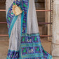White & Blue Patola Printed Soft Cotton Silk Saree with Zari Border