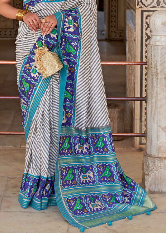 White & Blue Patola Printed Soft Cotton Silk Saree with Zari Border