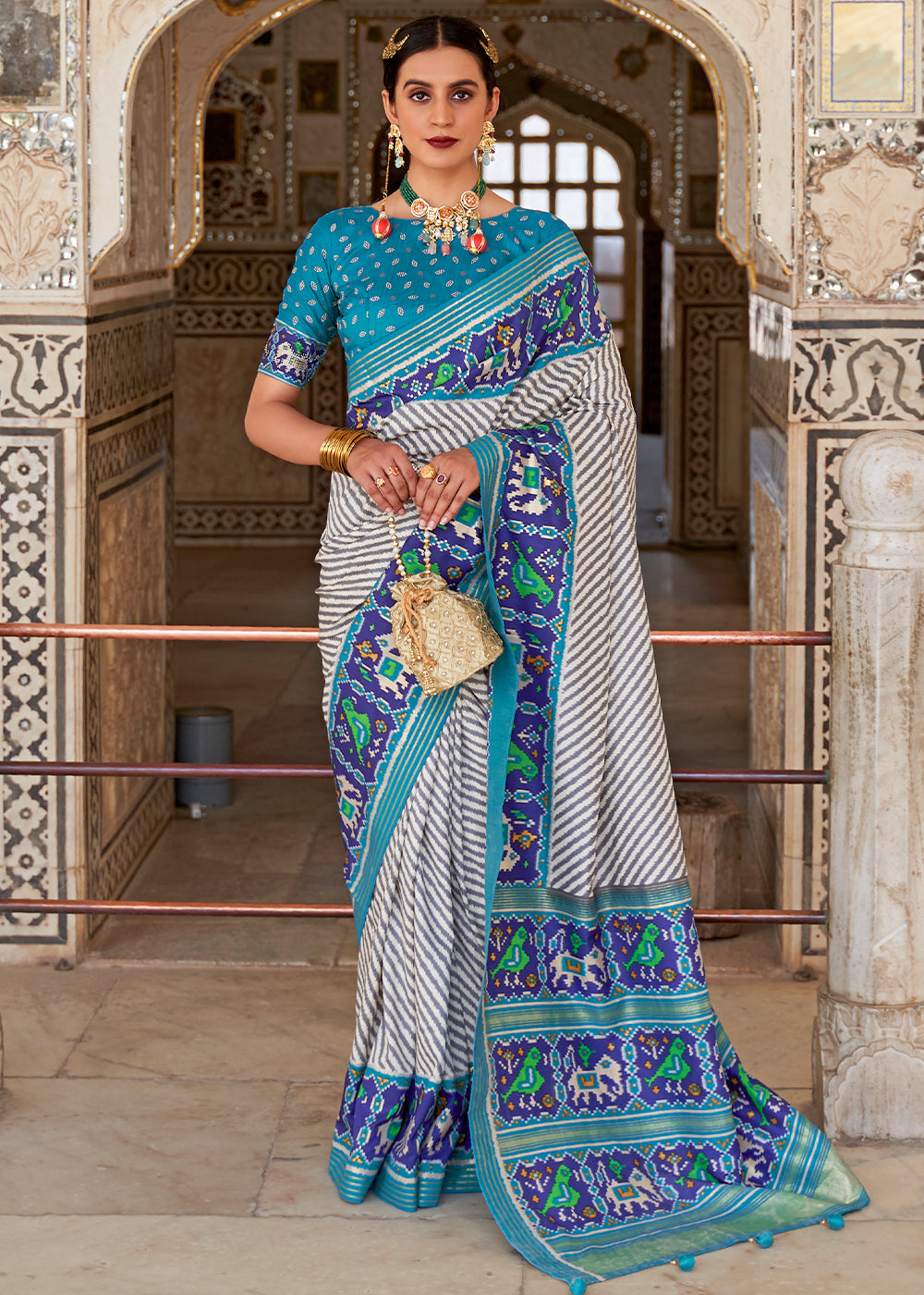 White & Blue Patola Printed Soft Cotton Silk Saree with Zari Border