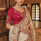 Cream Tissue Satin Saree with Rani Pink Embroidered Silk Blouse