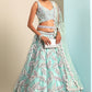 Turquoise Blue Organza Lehenga Choli with Sequins & Zarkan Embroidery work