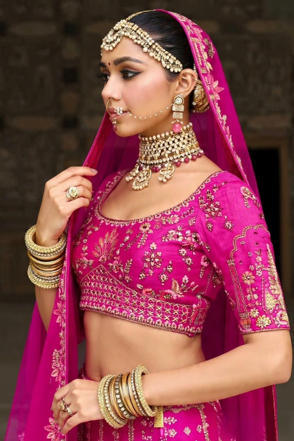 Rani Pink Kalidar Silk Lehenga with Royal Wedding Motifs
