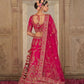 Rani Pink Silk Bridal Lehenga with Doli-Baraat & Peacock Motif Embroidery