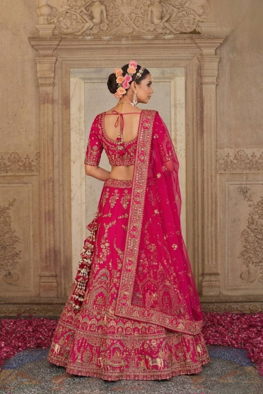 Rani Pink Silk Bridal Lehenga with Doli-Baraat & Peacock Motif Embroidery