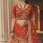 Rust Orange Silk Bridal Lehenga with Heritage Elephant and Peacock Motifs