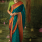 Teal Elegance Brasso Saree with Intricate Thread & Zari Work
