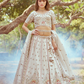 Gold Crushed Tissue Lehenga Choli with Moti and Zari Work