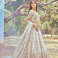 Gold Crushed Tissue Lehenga Choli with Moti and Zari Work