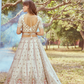 Gold Crushed Tissue Lehenga Choli with Moti and Zari Work