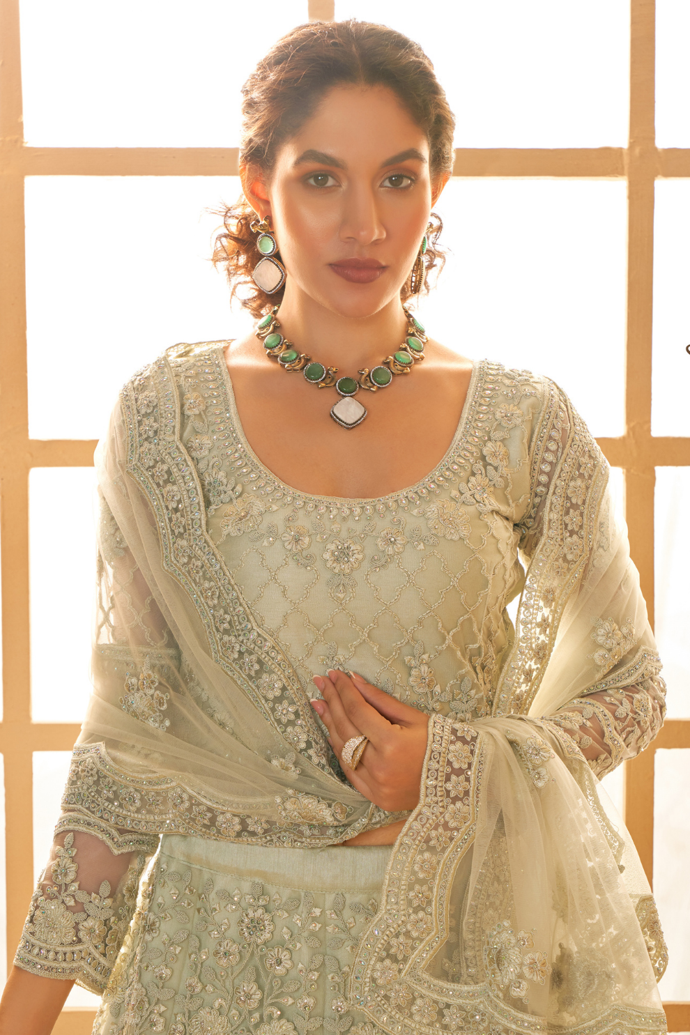 Elegant Pista Green Net Lehenga Choli With Rich Embroidery