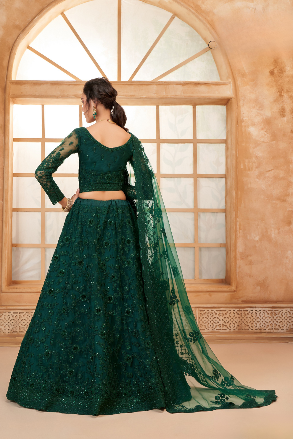Graceful Dark Green Embroidered Lehenga In Net With Diamond