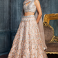 Charming Peach Sequins Net Engagement Wear Lehenga Choli With Dupatta