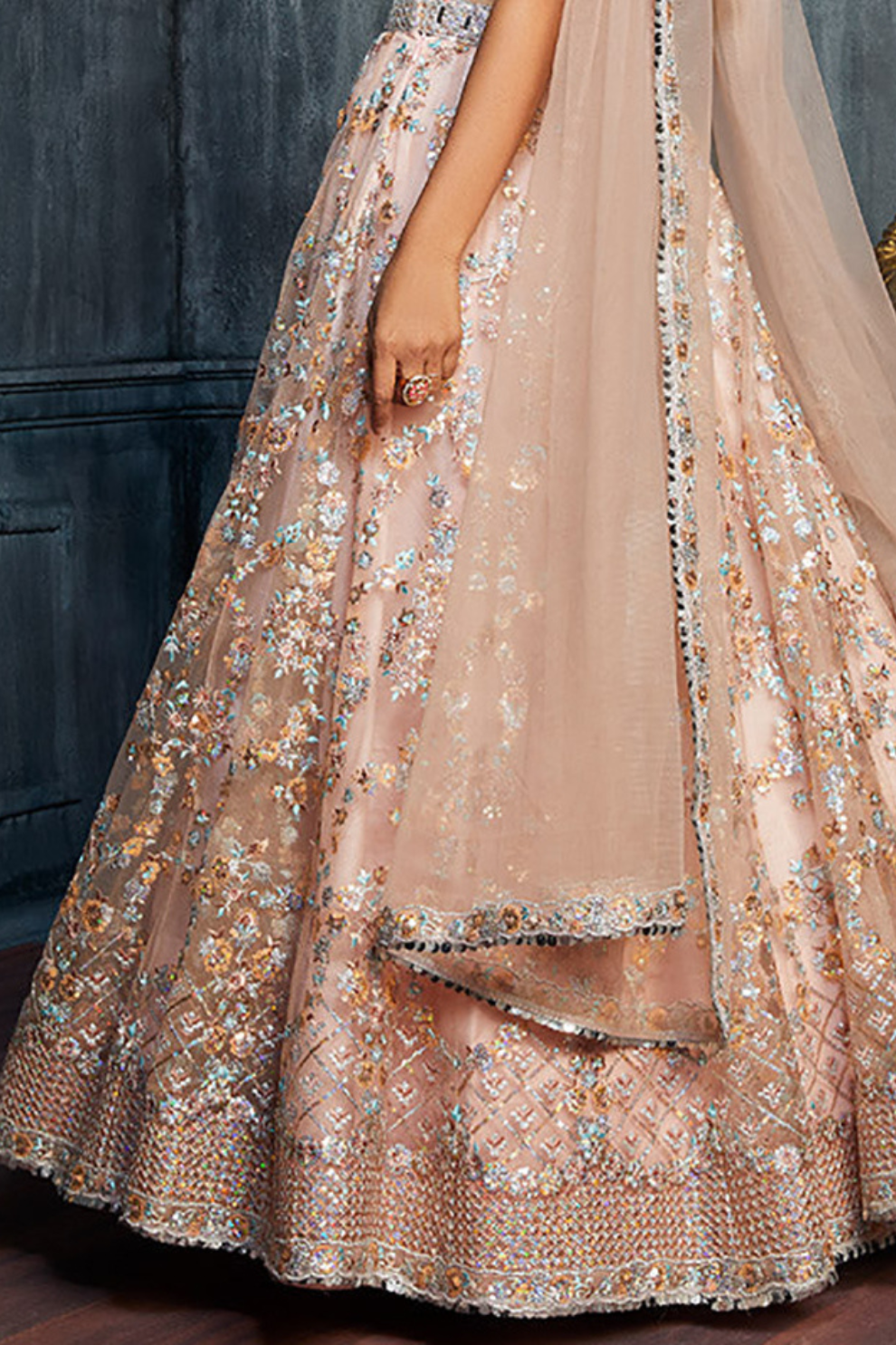 Charming Peach Sequins Net Engagement Wear Lehenga Choli With Dupatta