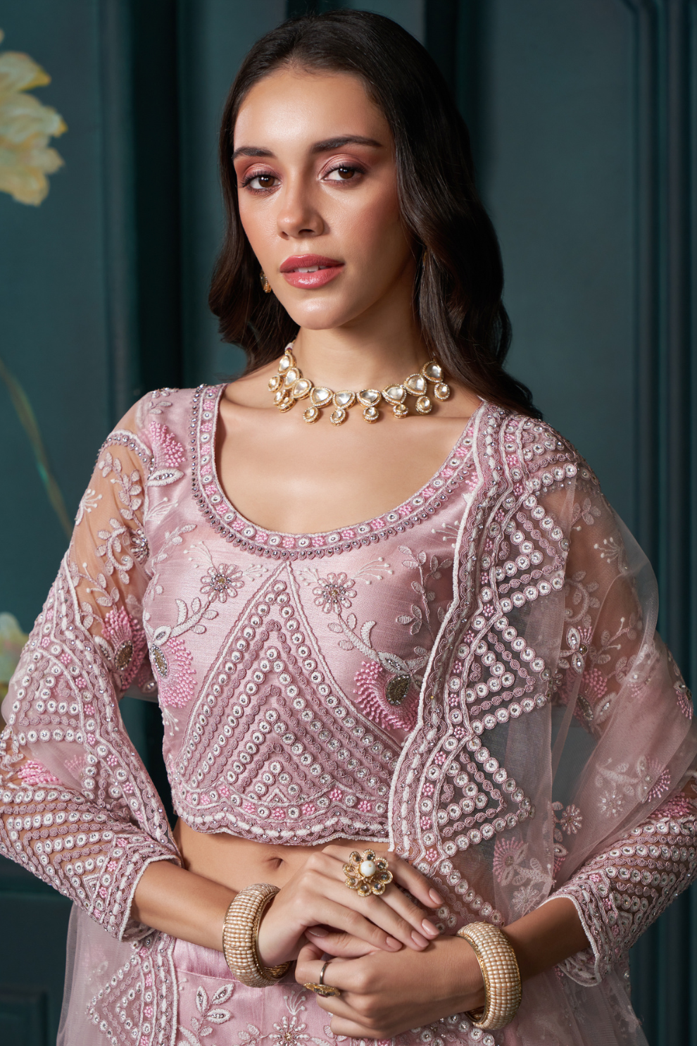 Elegant Dusty Pink Lehenga In Net With Hand Embroidery And Sequins