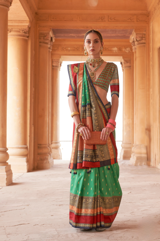 Kanjivaram Style Silk Saree with Designer Brooch and Clutch