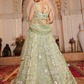 Glamorous Tissue Lehenga Choli & Dupatta with Intricate Sequins Work