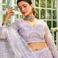 Graceful Net Lehenga Choli Ensemble with Beads