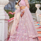 Designer Net Lehenga Choli with Intricate Sequins and Zarkan Work