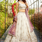 Elegant Tissue Lehenga Choli with Sequins and Thread Embroidery and Matching Dupatta