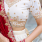 Traditional Ivory Lehenga Set with Intricate Embroidery & Red Dupatta
