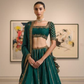 Elegant Dark Green Designer Lehenga with Intricate Golden Work
