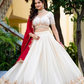 Traditional Ivory Lehenga Set with Intricate Embroidery & Red Dupatta